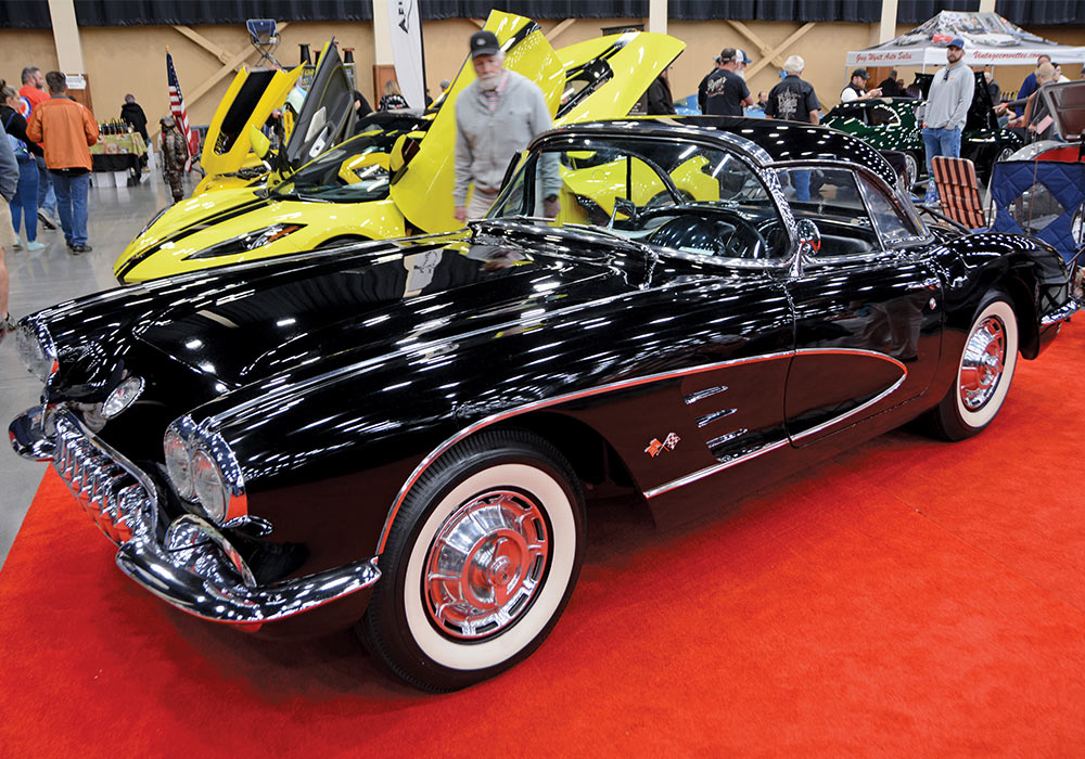 black car white-detailed tires 