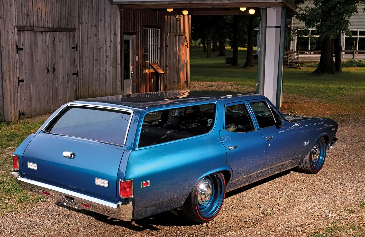 3/4 view of a blue '69 Nomad from rear
