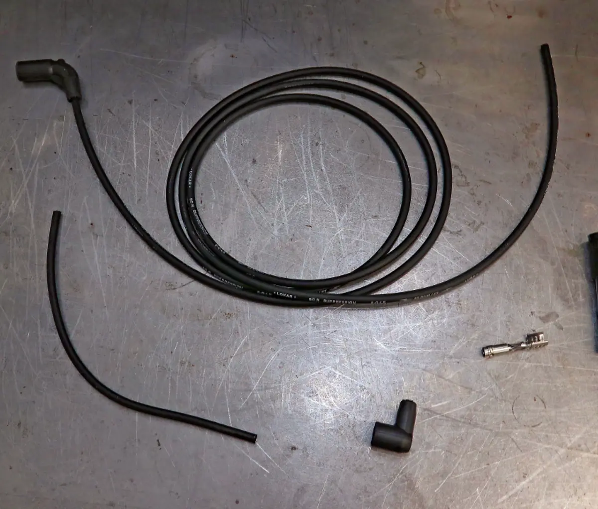 top view of a plug wire on a workshop surface