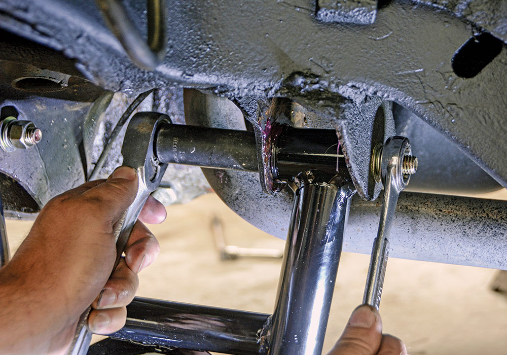 The CPP control arm kit comes with all new hardware, so once we had the lower arms aligned, we slid the new bolts into place