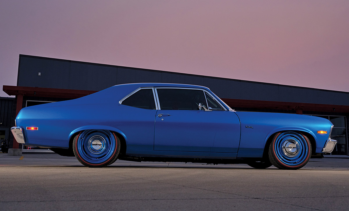 Rear three-quarter view of a 1971 Chevrolet Nova SS, emphasizing the car's stance and rear design at dusk