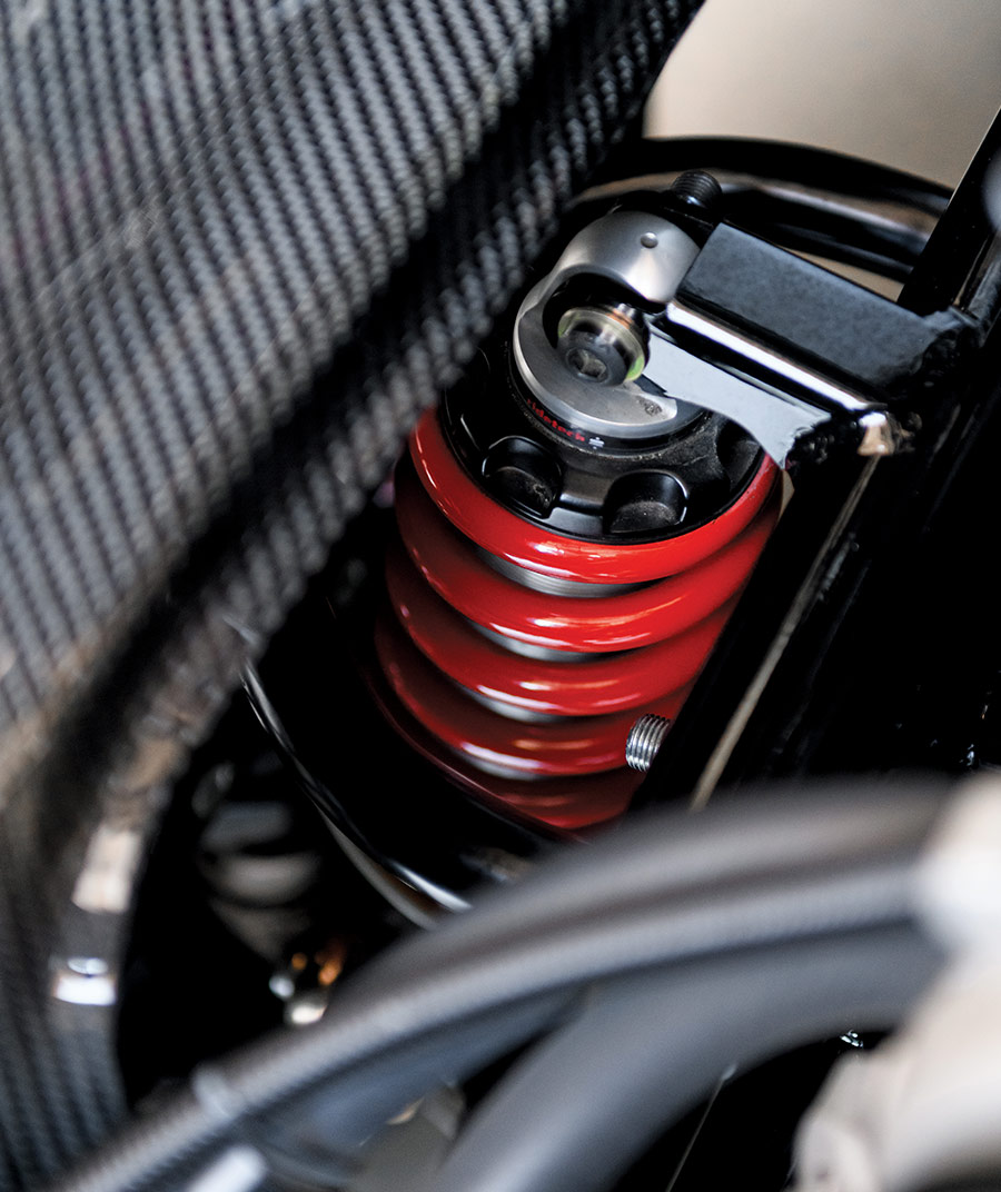 Close-up of the red coilover suspension system on the 1969 Camaro Z28, designed for enhanced handling