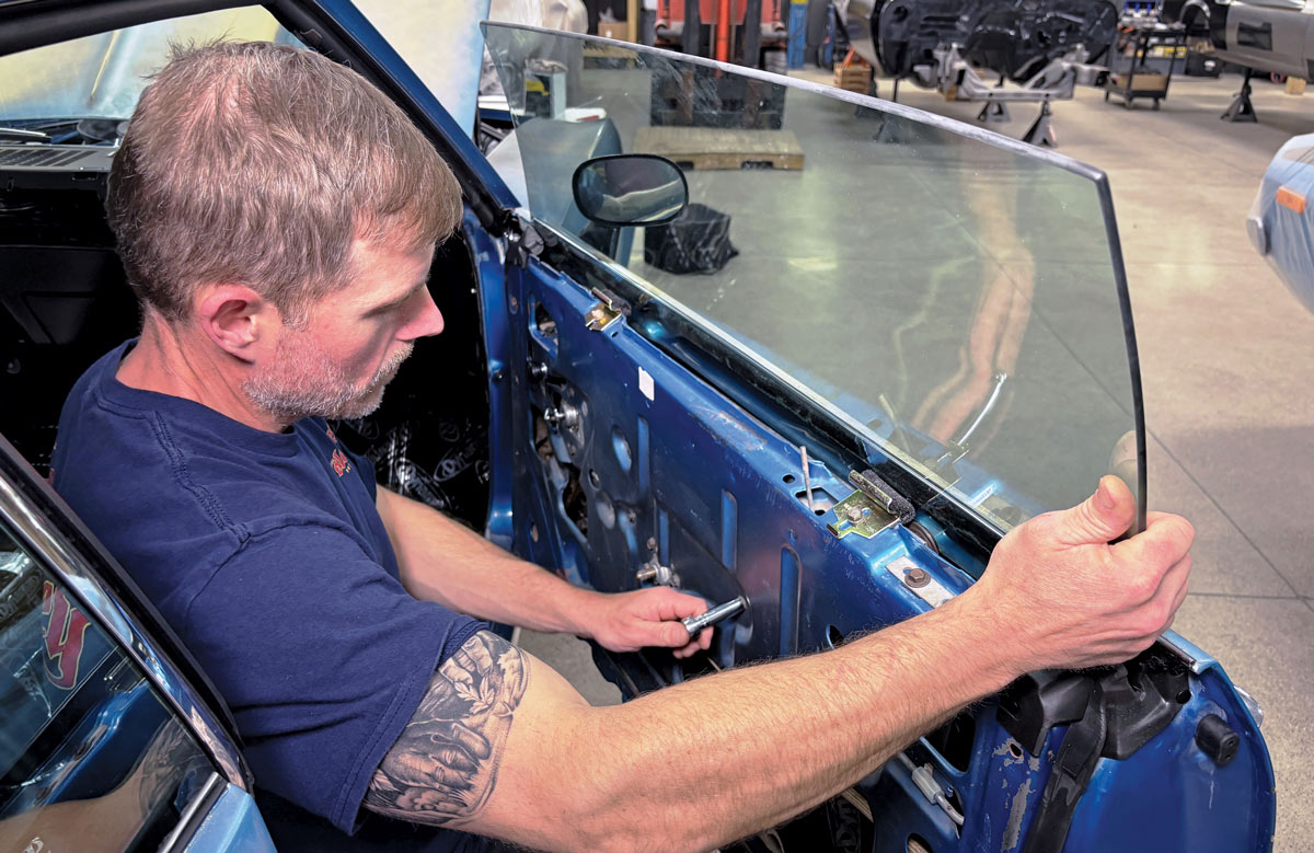 man adjusting window's position