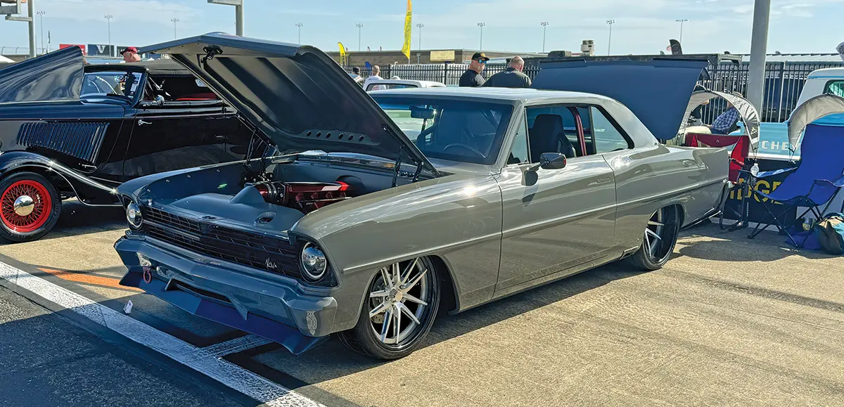 1967 Chevrolet Nova custom build with a lowered stance and gray paint at Triple Crown event