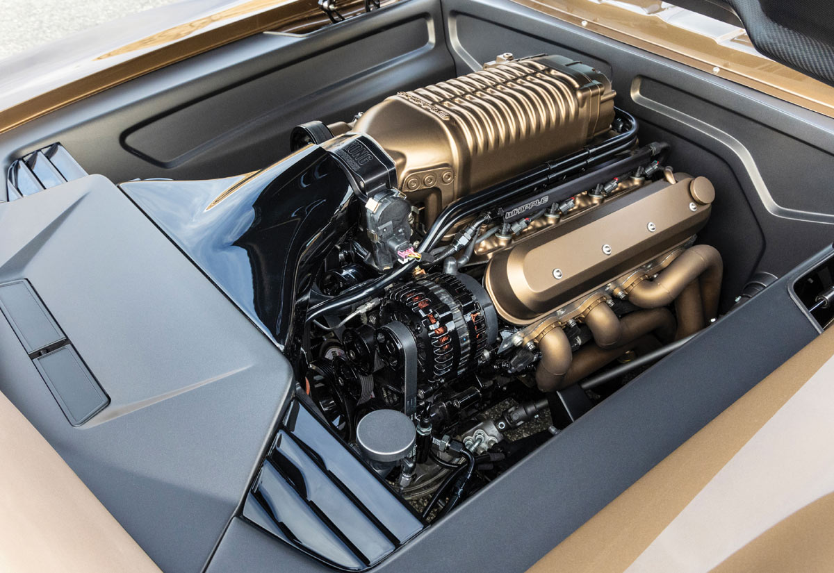 Whipple supercharged engine in the custom 1969 Chevy Camaro's cleanly detailed engine bay
