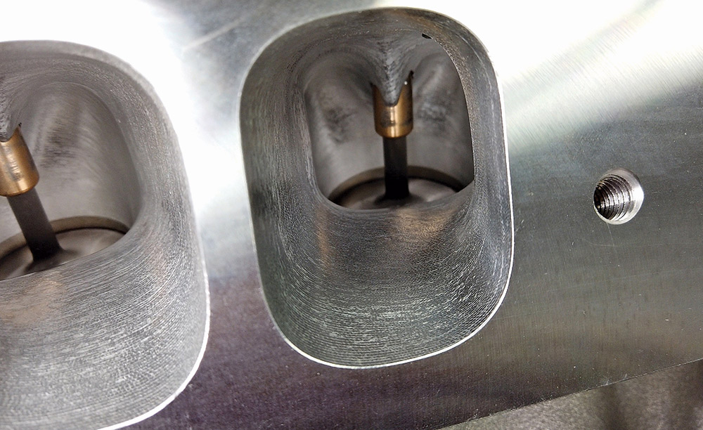Close-up of intake valve ports inside a Brodix Chevy big block cylinder head