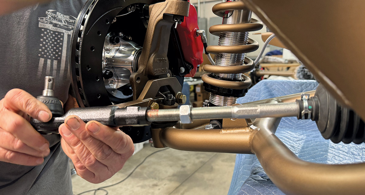 Installing a tie rod end on a custom suspension setup for a Chevrolet Nova with modern upgrades