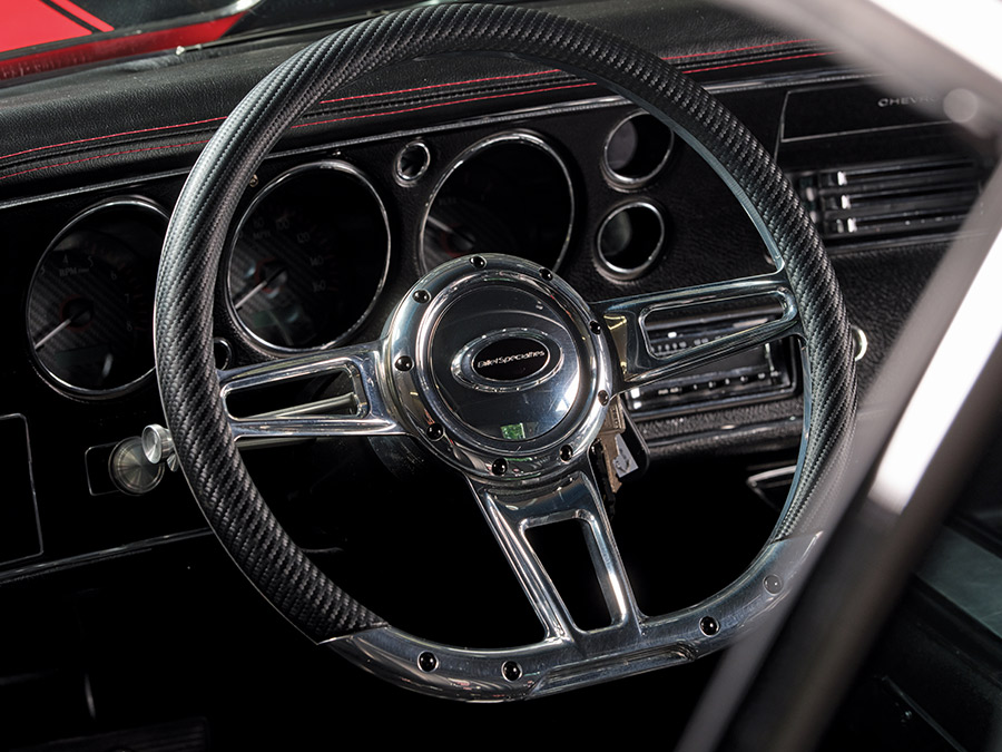 Steering wheel of the 1970 Chevelle, featuring a chrome and carbon fiber mix