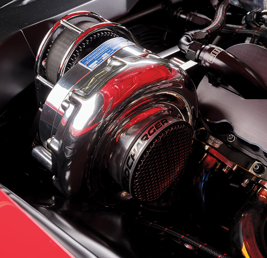 Steve Morris custom engine logo inside the 1970 Chevelle, revealing high-performance headers