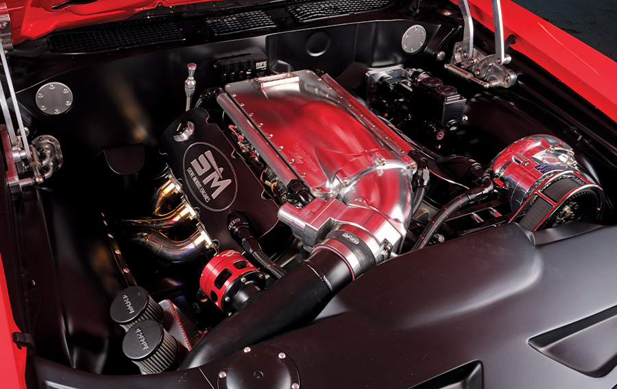 Close-up of a polished ProCharger supercharger under the hood of the 1970 Chevelle