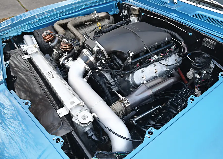 Precision turbo wastegate components in the engine bay of the 1969 Chevy Camaro Z28