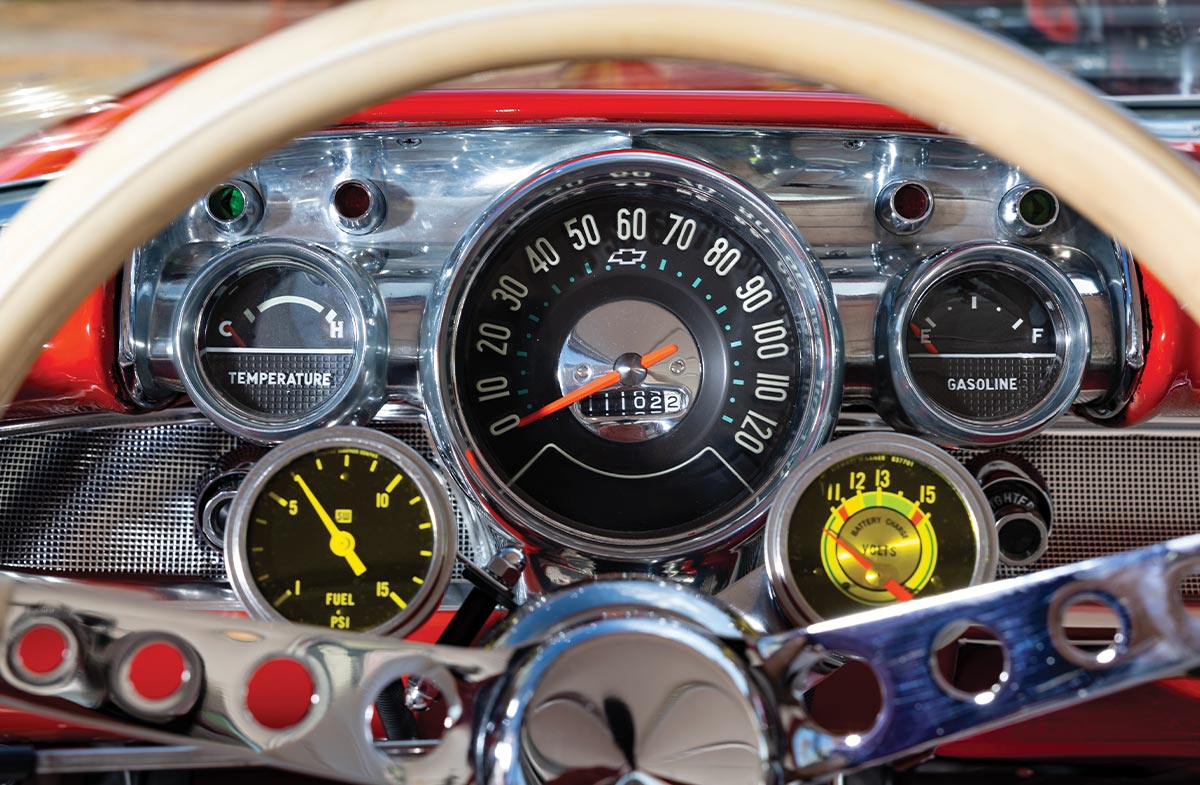dashboard of the 1957 Chevy Bel-Air gasser with classic and auxiliary gauges, including fuel pressure and voltage