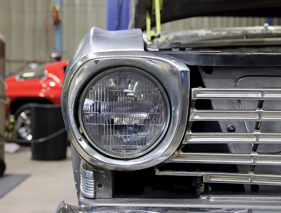 closeup of headlight bezels and fenders of a 1963 Chevy II