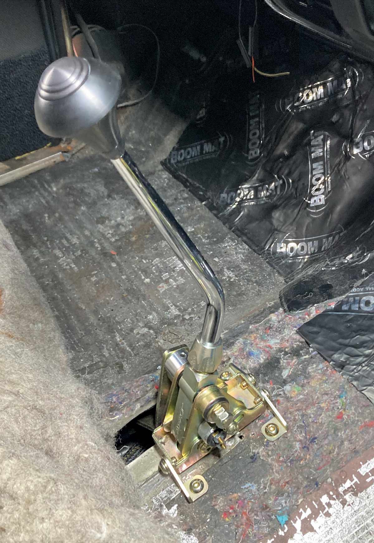 1957 Chevy interior with Lokar shifter mounted and Boom Mat insulation visible