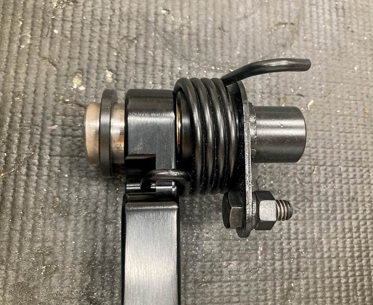 1957 Chevrolet pedal assembly spring and pivot detail during preparation