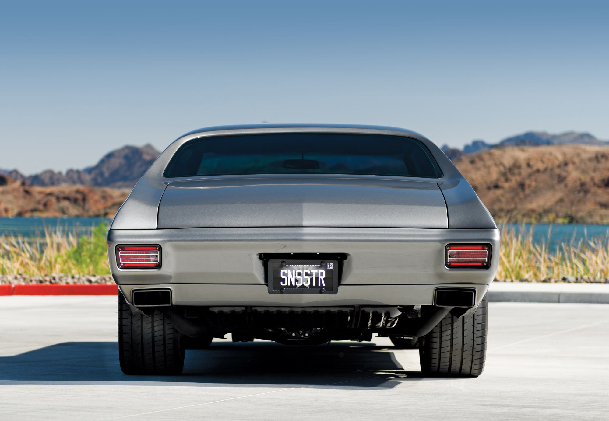 1970 Chevy Chevelle rear shot highlighting custom SNSSTR license plate and blacked-out taillights