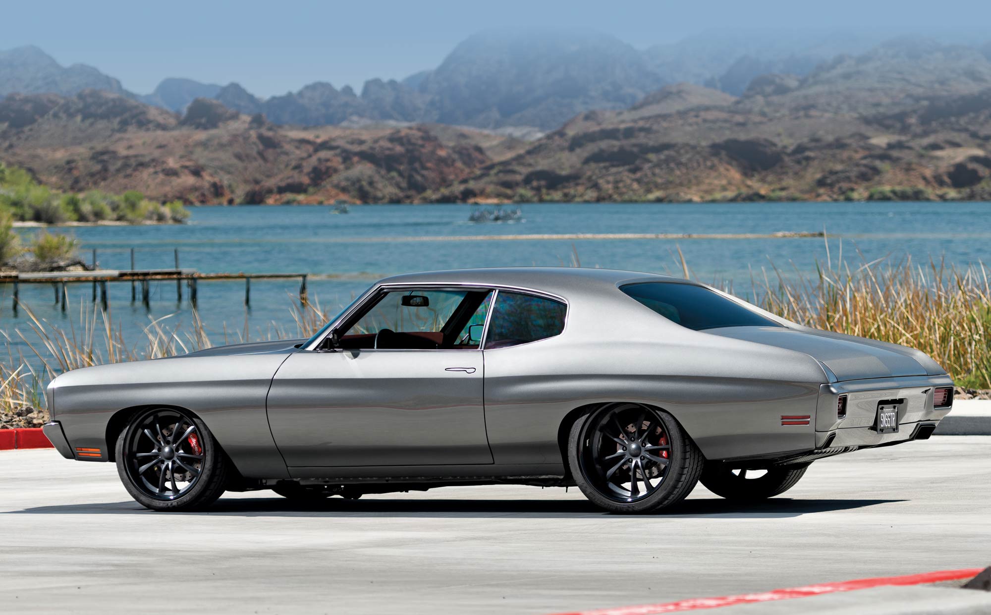 1970 Chevy Chevelle rear profile with custom dual exhausts and iconic flowing lines