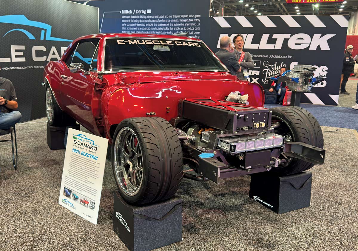 1969 Chevrolet Camaro E-Muscle red electric restomod showcasing advanced EV technology at SEMA