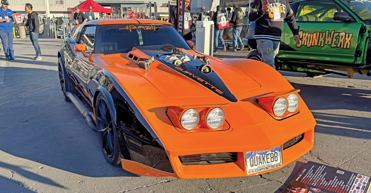 1977 Chevrolet Corvette custom orange and black widebody with a supercharged engine displayed at SEMA