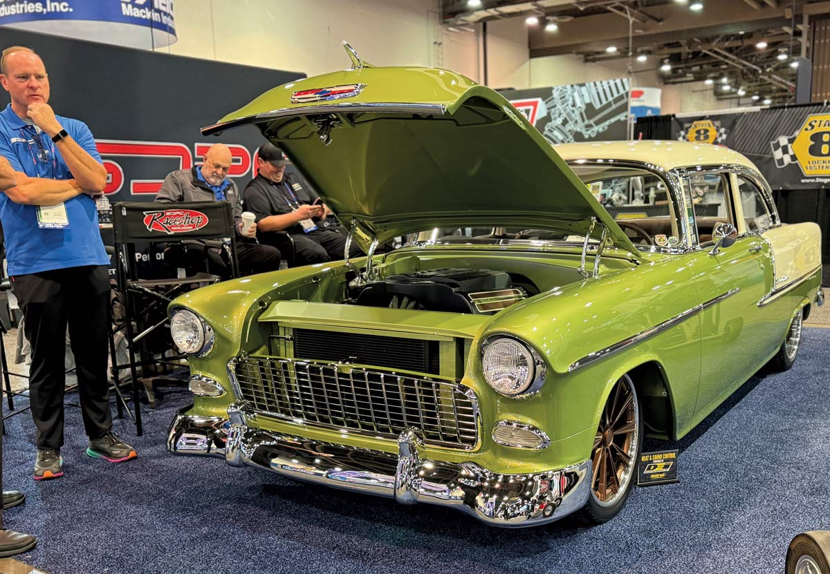 1955 Chevrolet Bel Air green and cream custom with polished chrome and bronze wheels at SEMA