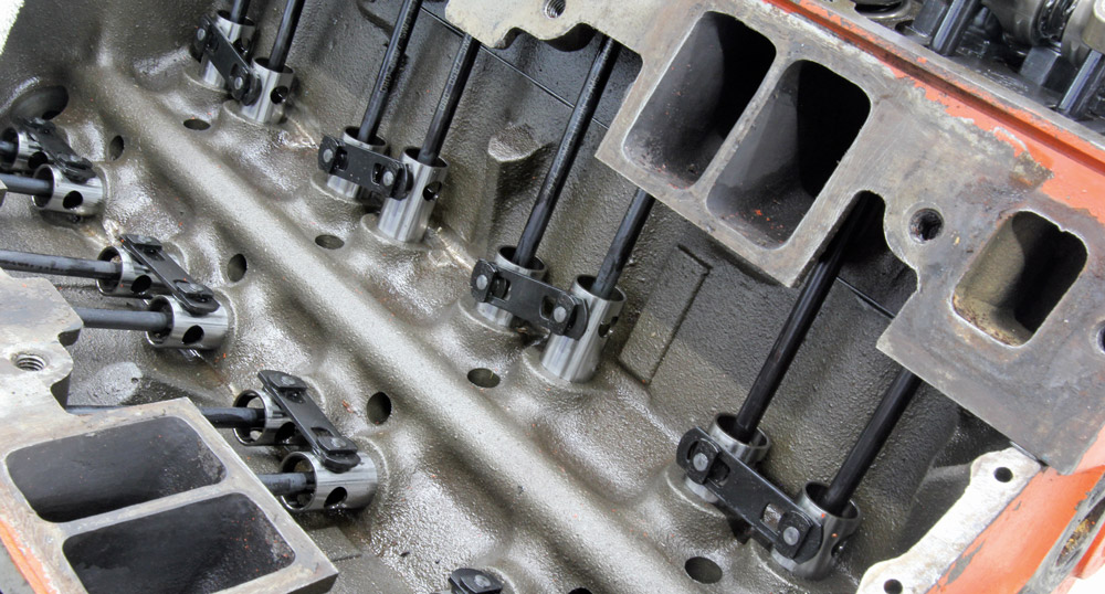 An overhead view of the Chevy small-block lifter gallery, showcasing pushrods and lifters set in alignment
