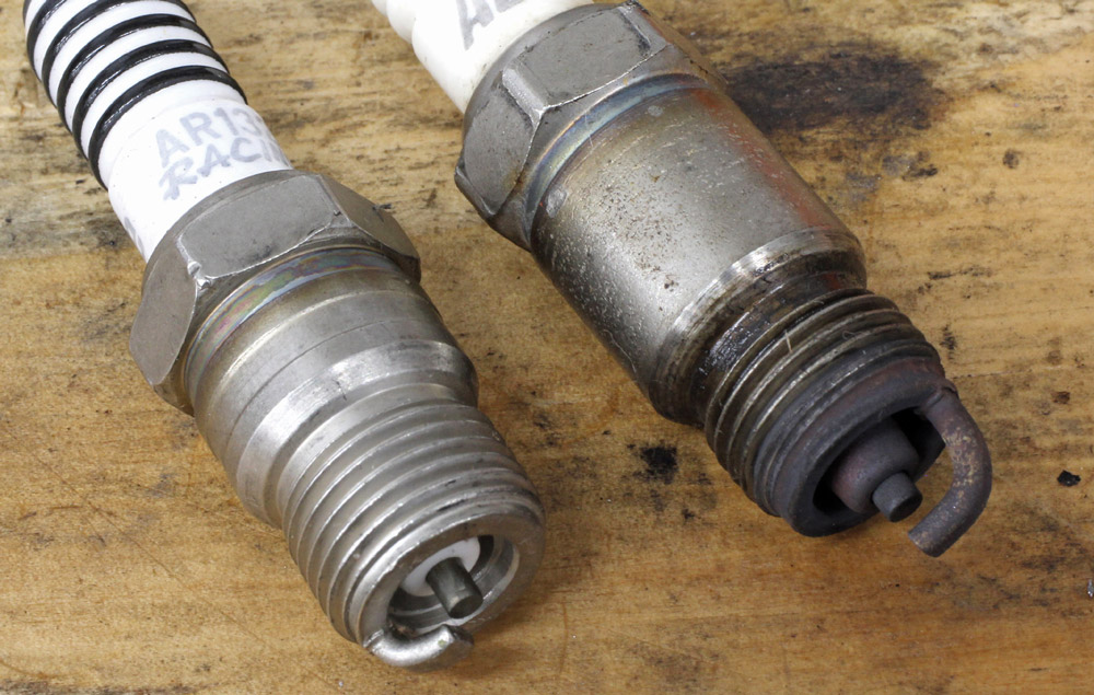 Comparison of new and used spark plugs for Chevy small block maintenance