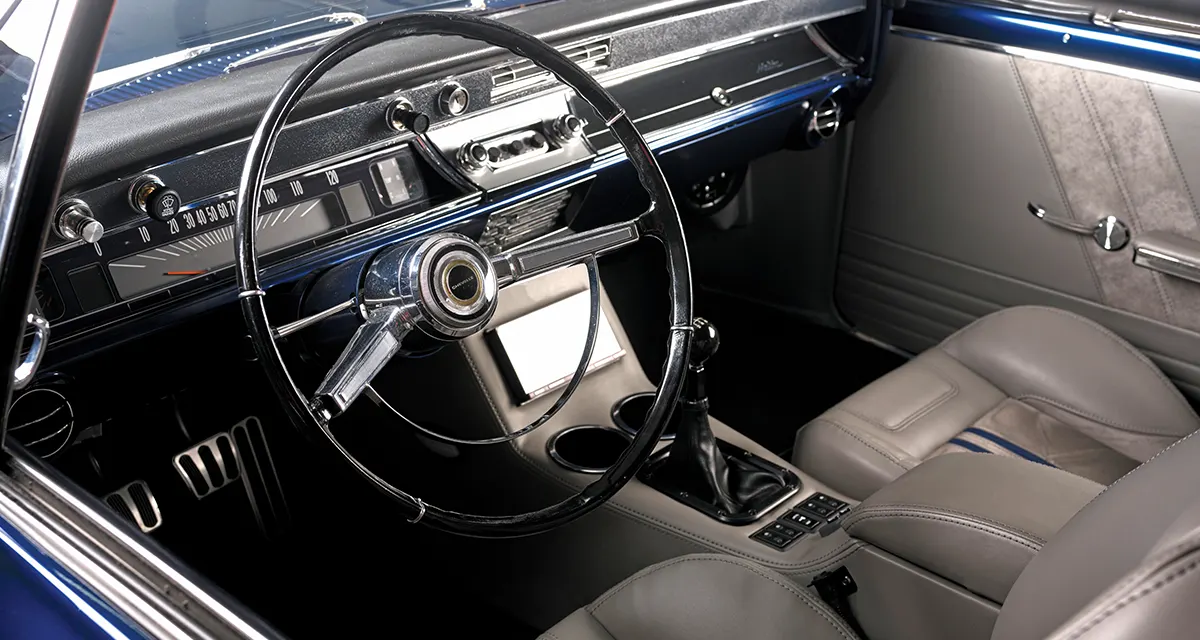 1966 Chevy Chevelle interior, custom leather seats, modern center console, and classic dash design