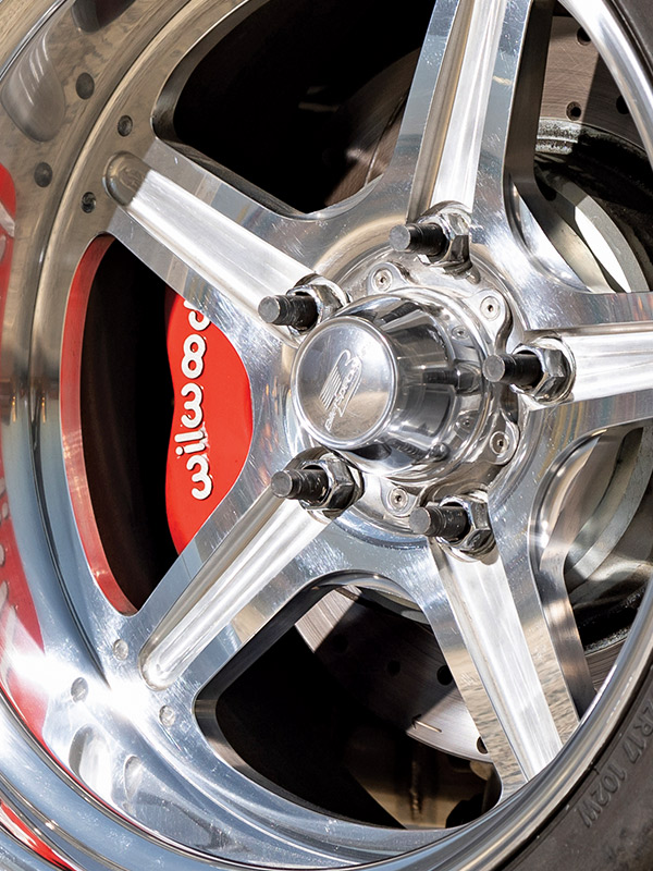 1969 Chevy Camaro with polished wheels and red Wilwood brake calipers for enhanced stopping power and style