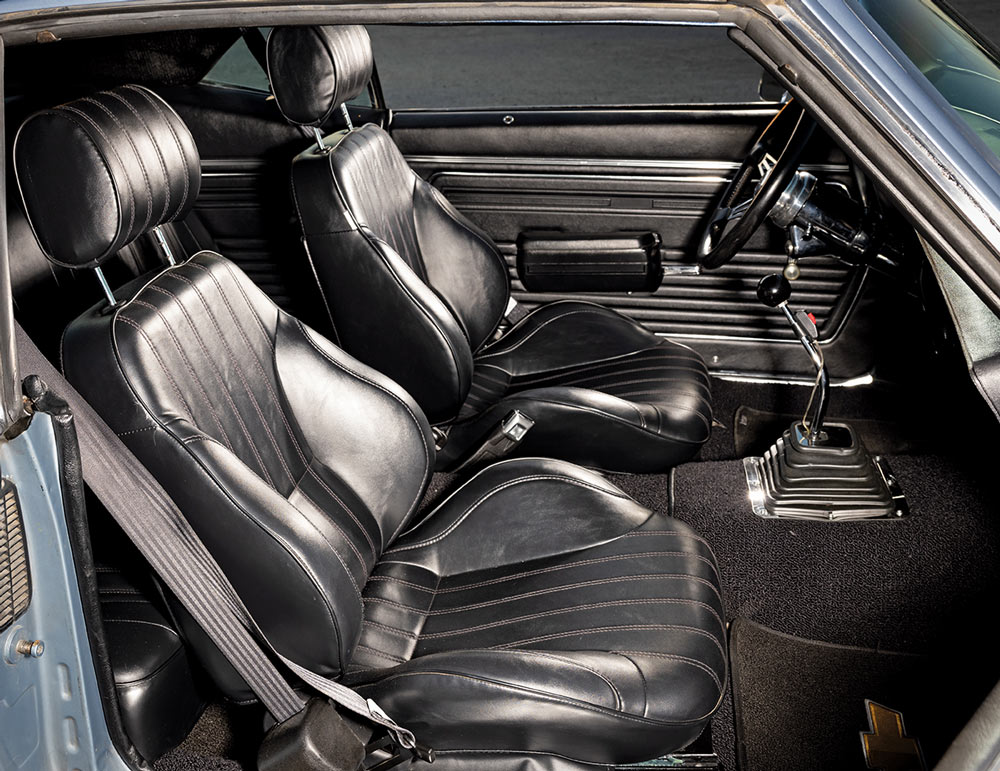 1969 Chevrolet Camaro custom carbon fiber gauge cluster highlighting performance-focused dashboard