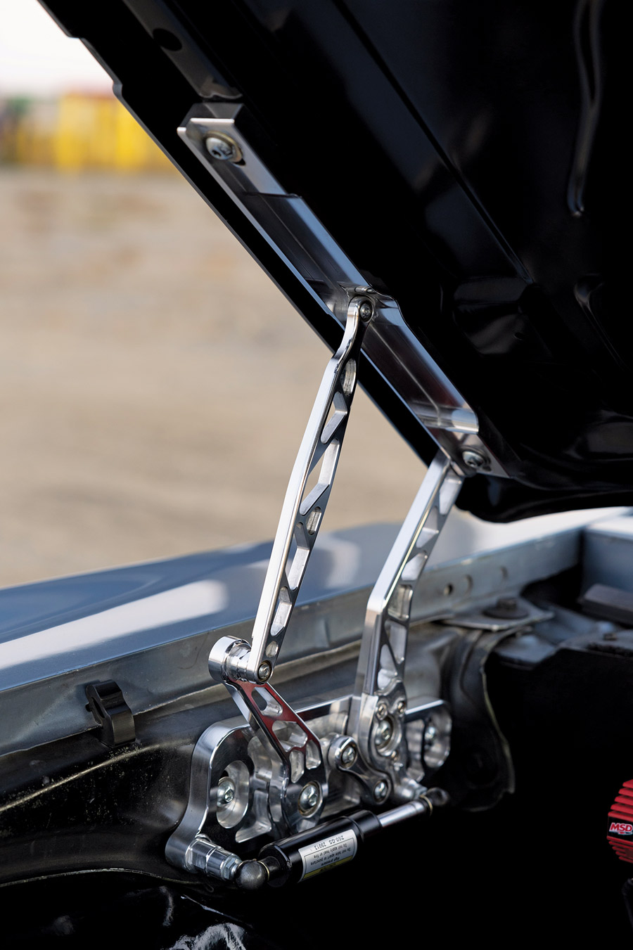 1969 Chevy Camaro featuring billet aluminum hood hinges for durability and sleek custom design