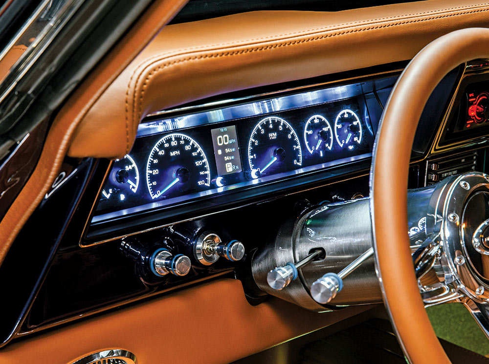 1966 Chevy Nova digital dashboard with illuminated gauges and tan leather-wrapped accents
