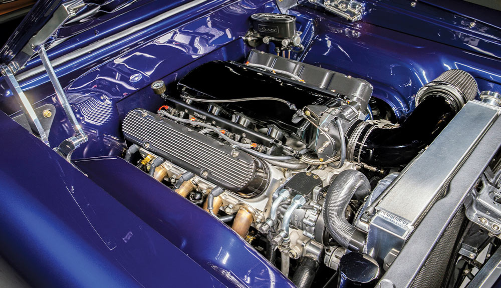 1966 Chevy Nova engine bay, custom valve covers, polished intake, and high-performance components