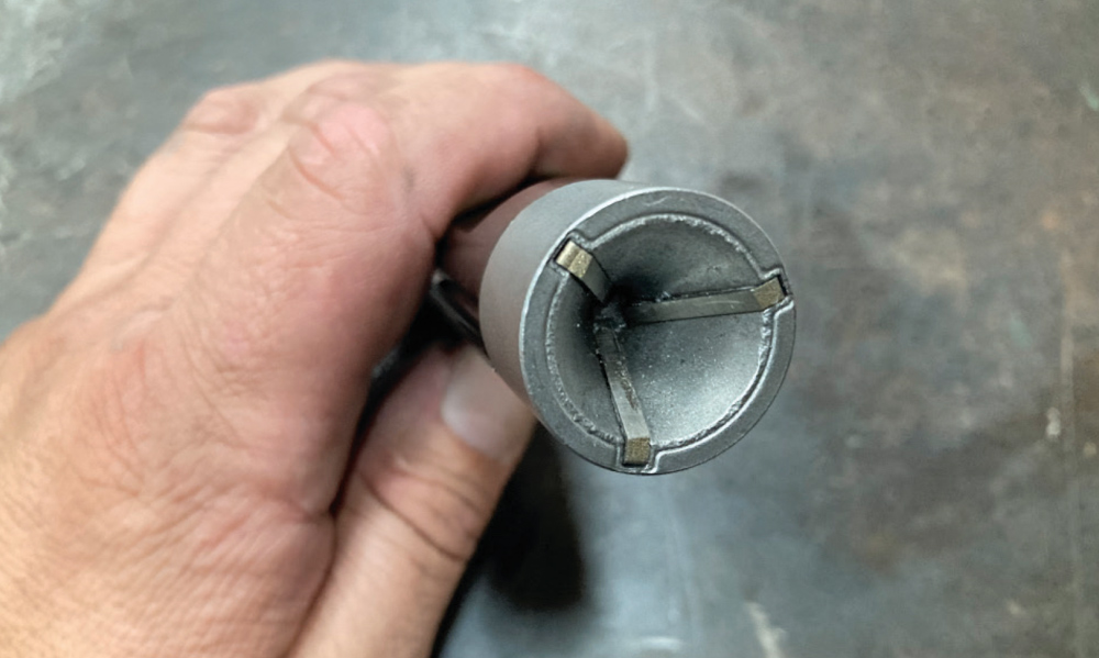 close-up of a deburred and chamfered stainless steel fuel line end for fitting installation