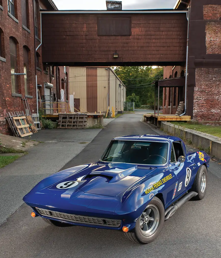 1966 Chevrolet Corvette, blue, front three-quarter view, Roger Penske Chevrolet livery, race-inspired design, and side pipes