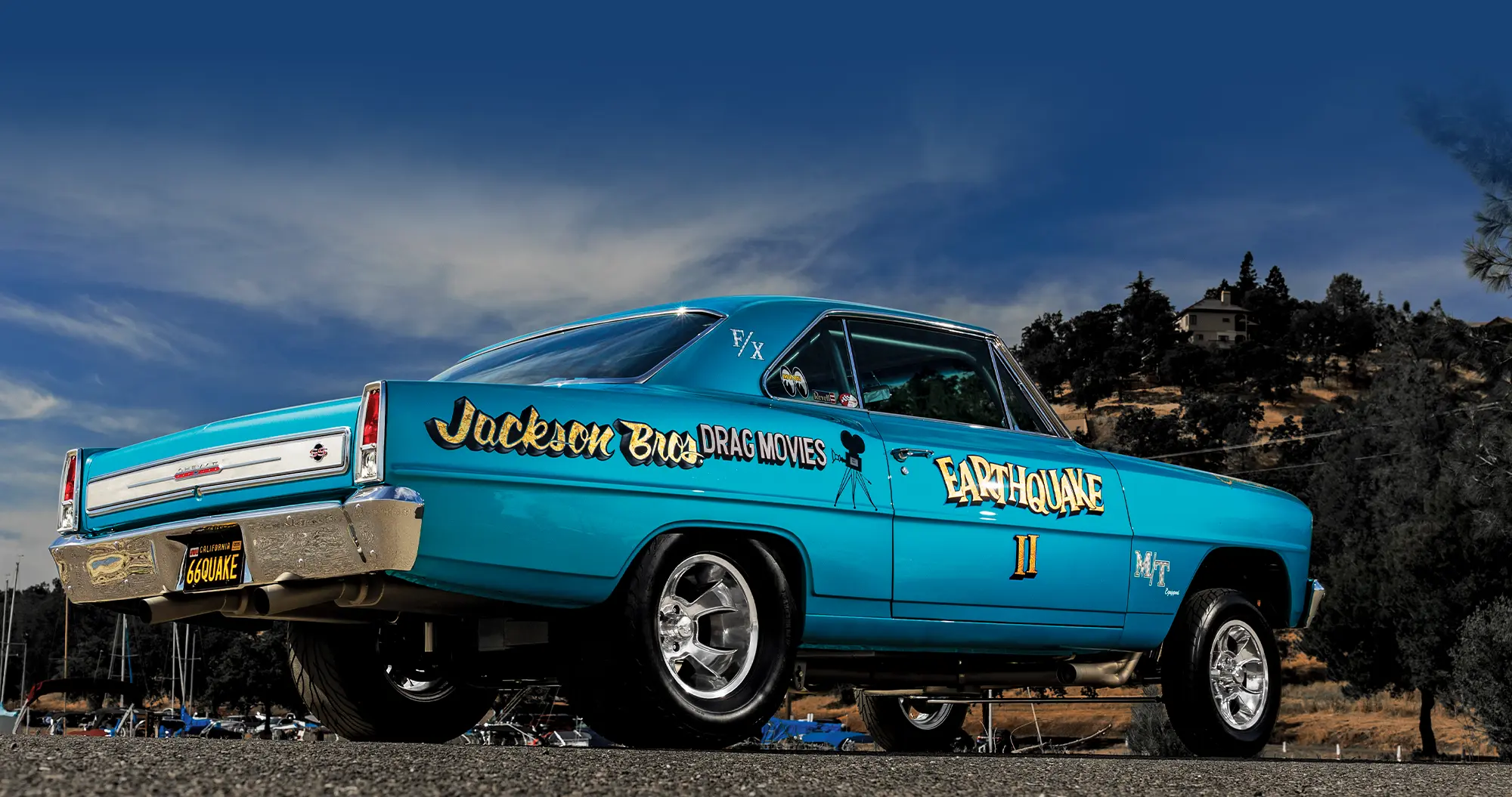 1966 Chevrolet Nova Gasser side-rear view capturing the car's stance, graphics, and classic drag racing appeal