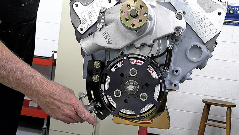 Chevy 424 small block engine with water pump, harmonic balancer, and AFR cylinder heads installed