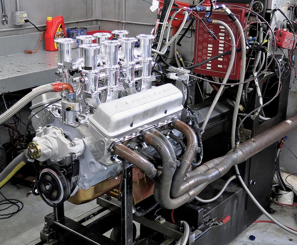 Fully assembled Chevy 424 small block engine on a dynamometer, ready for performance testing