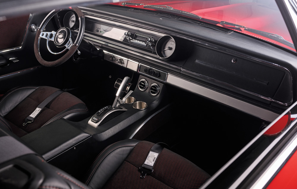 1965 Chevrolet Impala SS custom interior, black leather seats with red stitching, modern console, and updated trim