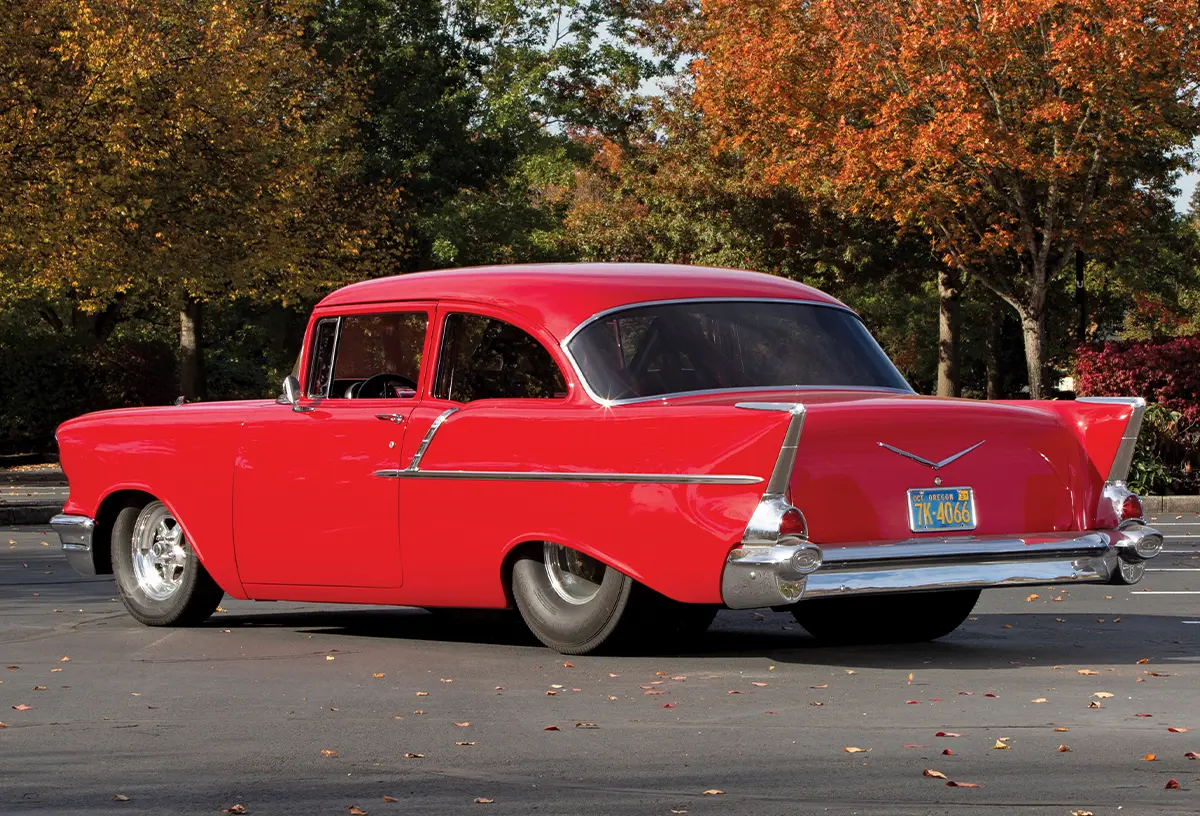 Rear angle of the Chevy Bel Air highlighting its signature tail fins and chrome trim