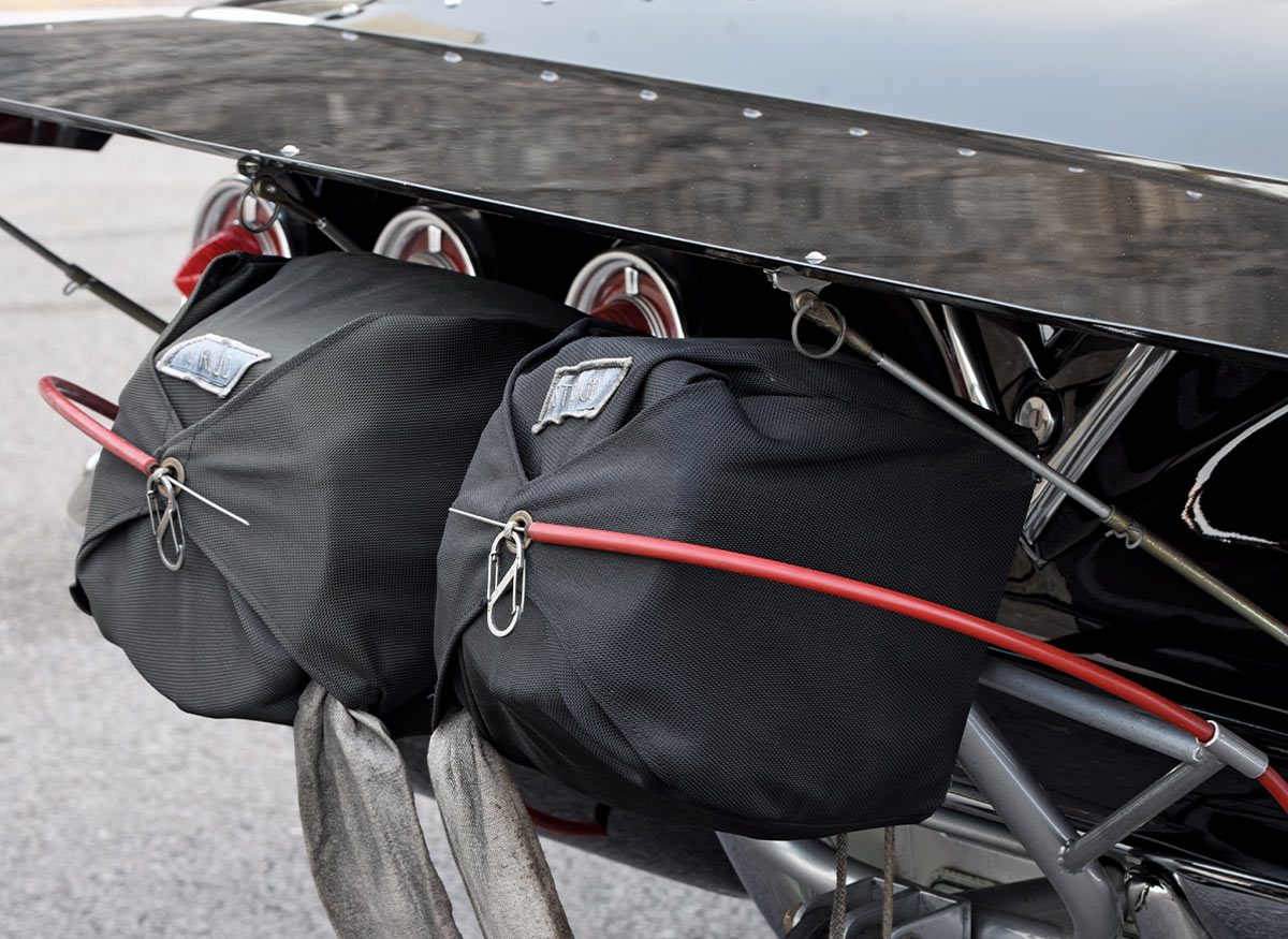 1961 Chevrolet Impala parachutes with twin drag chutes and rear wing for high-speed braking and stability