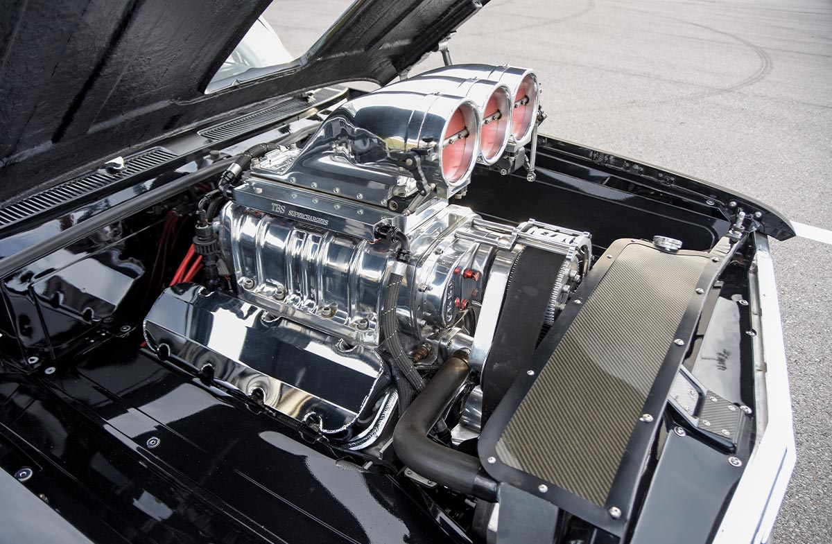 1961 Chevrolet Impala rear suspension with massive slick tires tucked under the fender for ultimate traction and stability