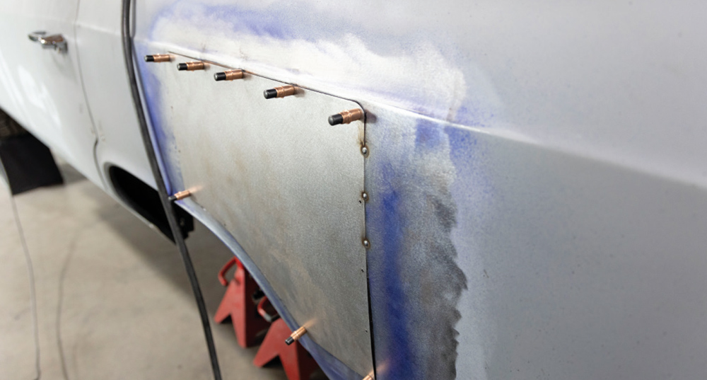 welded patch panel is secured in place, showing a clean and precise fitment