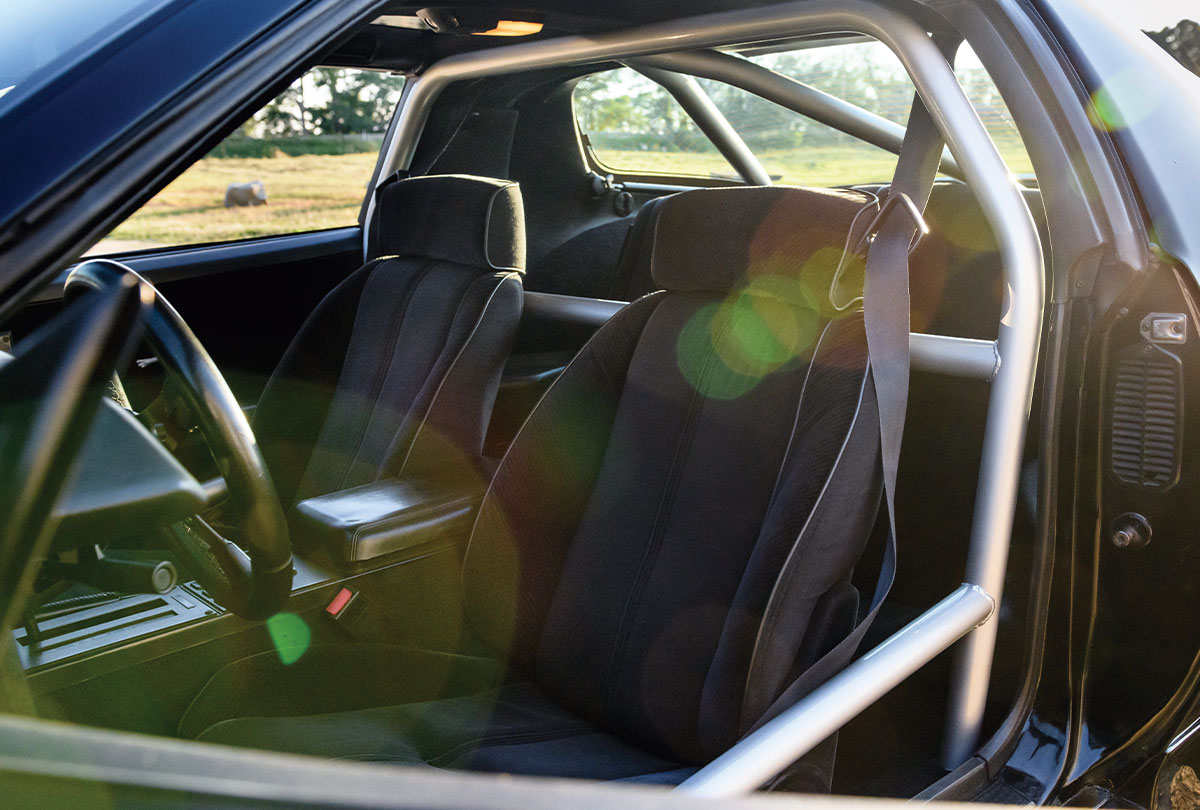 1986 Camaro IROC-Z interior with race-ready roll cage and reinforced safety structure
