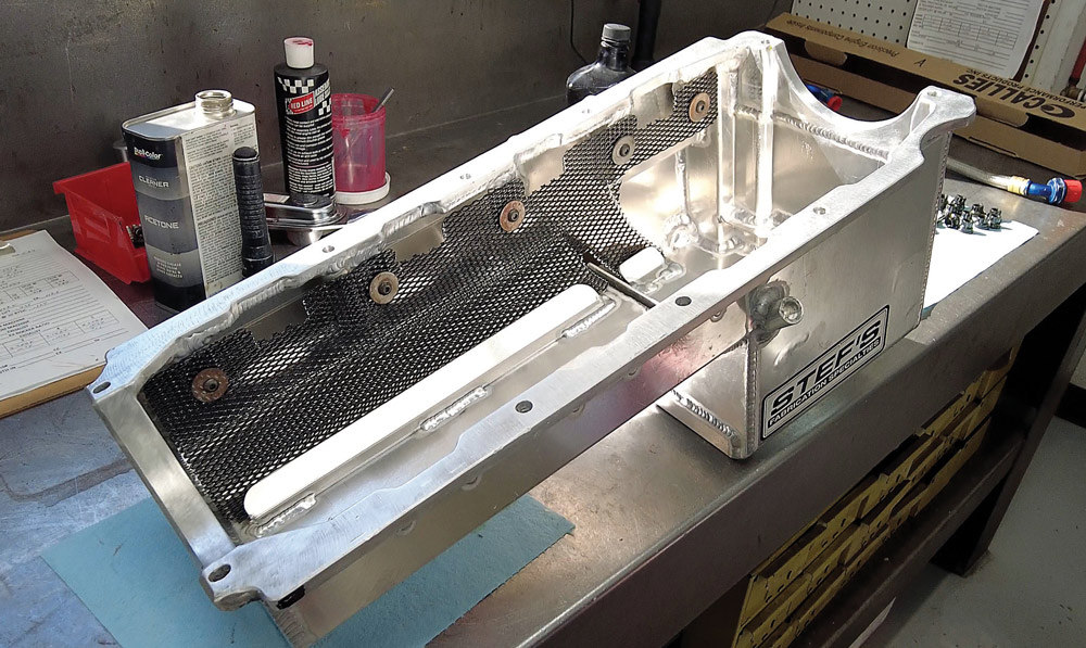 Stef’s custom aluminum oil pan baffled high-performance Chevy big block lubrication system
