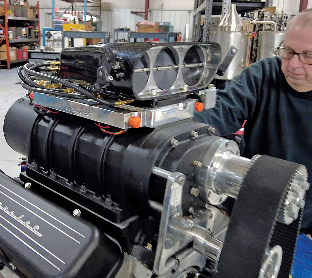 Blown big block Chevy triple butterfly intake Holley fuel system high-boost configuration