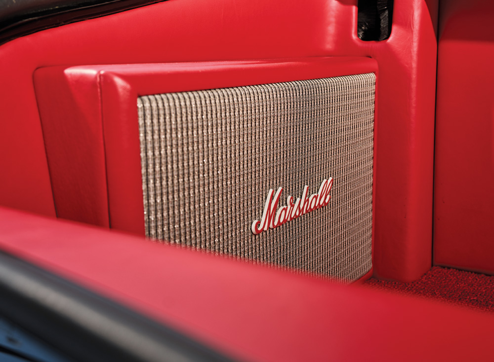 1971 Chevrolet Chevelle SS trunk with a custom Marshall speaker integrated into the red leather interior