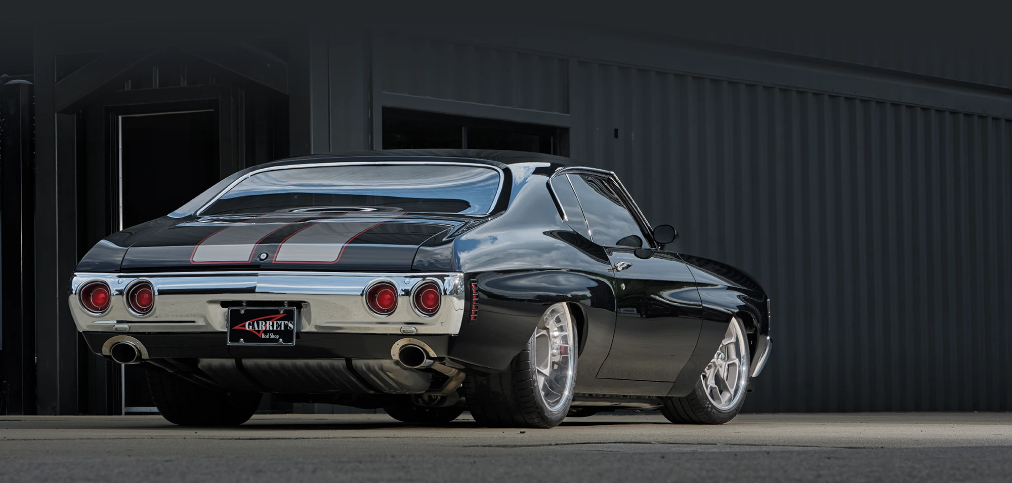 1971 Chevy Chevelle SS rear three-quarter view with quad taillights and dual exhaust tips