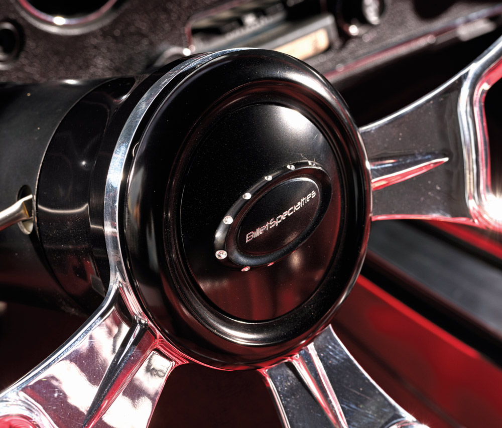 1971 Chevy Chevelle SS Billet Specialties steering wheel with chrome spokes and a black center cap