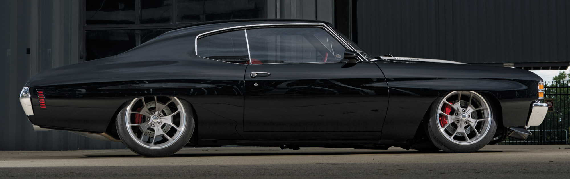 1971 Chevrolet Chevelle SS side profile showcasing deep-dish wheels and red brake calipers