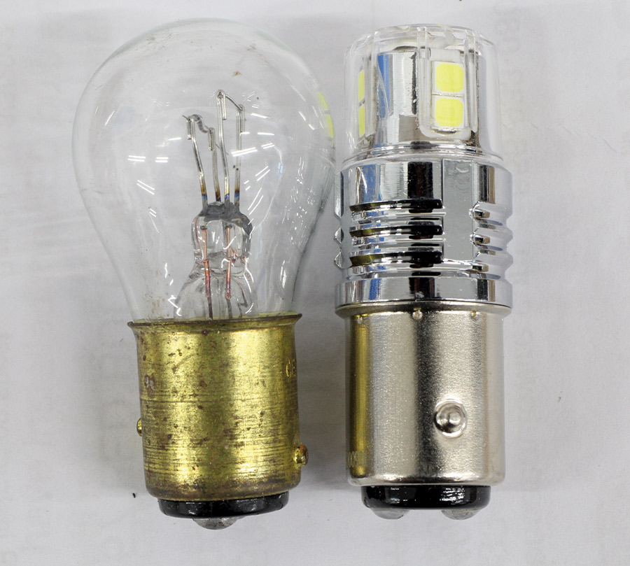 Comparison of traditional incandescent bulb versus modern LED upgrade for classic vehicles